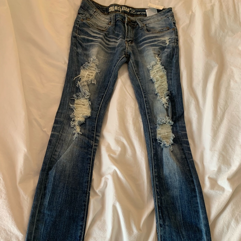 Distressed destructed skinny medium wash denim
